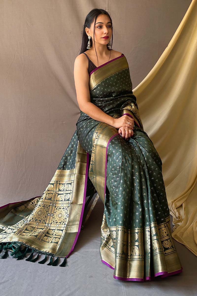 Surreptitious Dark Green Soft Banarasi Silk Saree With Scintilla Blouse Piece