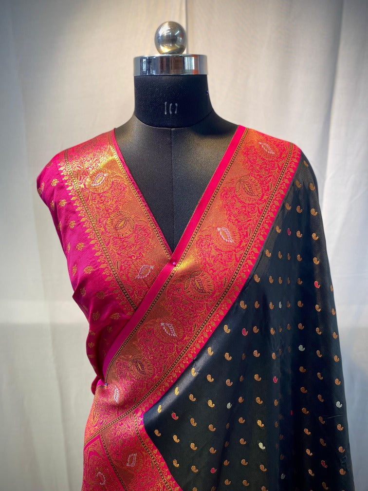 Flaunt Black Soft Banarasi Silk Saree With Capricious Blouse Piece