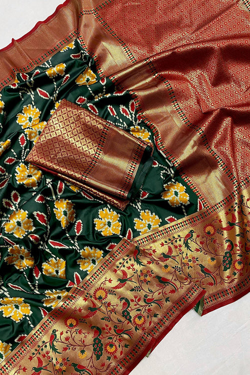 Load image into Gallery viewer, Adorning Dark Green Patola Silk Saree with Deserving Blouse Piece
