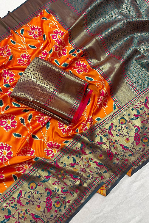 Load image into Gallery viewer, Mesmeric Orange Patola Silk Saree with Mesmeric Blouse Piece
