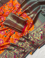 Mesmeric Orange Patola Silk Saree with Mesmeric Blouse Piece
