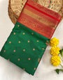 Rhapsody Green Soft Banarasi Silk Saree With Ethereal Blouse Piece