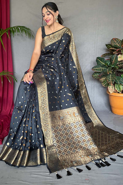 Enigmatic Black Soft Banarasi Silk Saree With Enamoring Blouse Piece