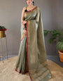 Inspiring Green Soft Banarasi Silk Saree With Opulent Blouse Piece