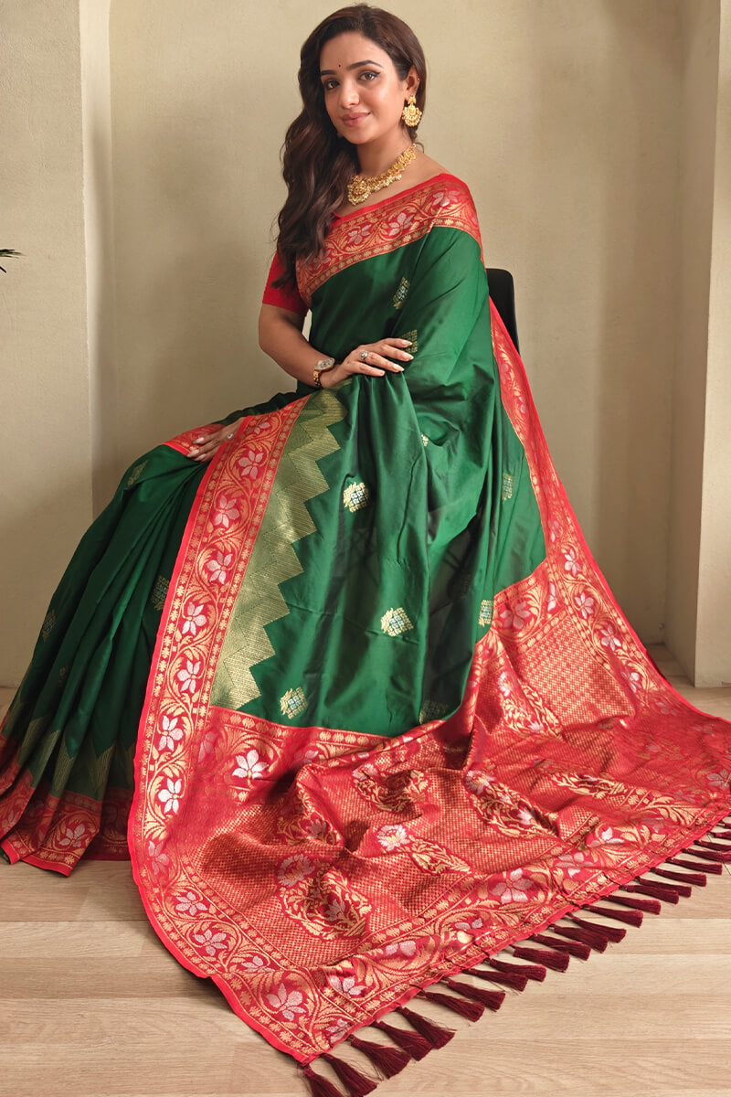 Radiant Dark Green Soft Banarasi Silk Saree With Hypnotic Blouse Piece