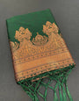 Engaging Dark Green Soft Banarasi Silk Saree With Snazzy Blouse Piece