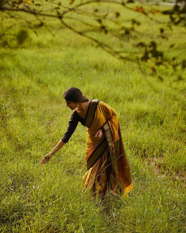 Lovely Yellow Soft Banarasi Silk Saree With Gleaming Blouse Piece