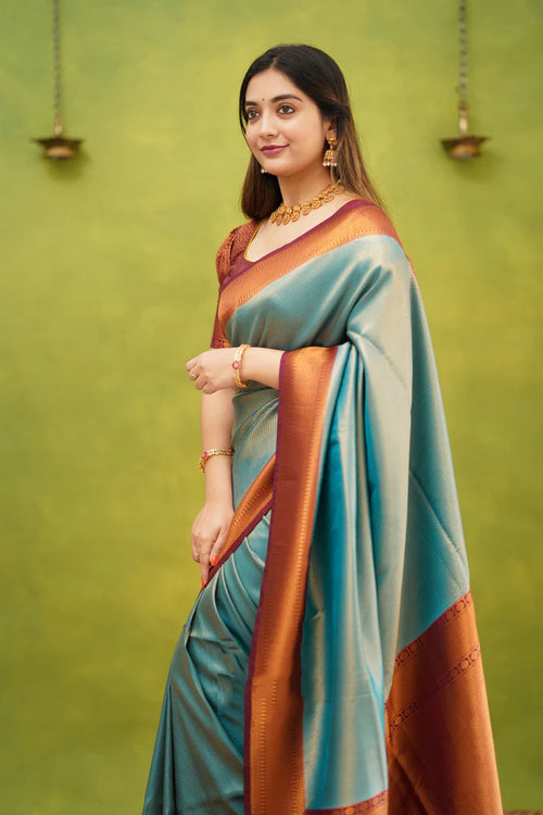 Load image into Gallery viewer, Exuberant Firozi Soft Banarasi Silk Saree With Supernal Blouse Piece
