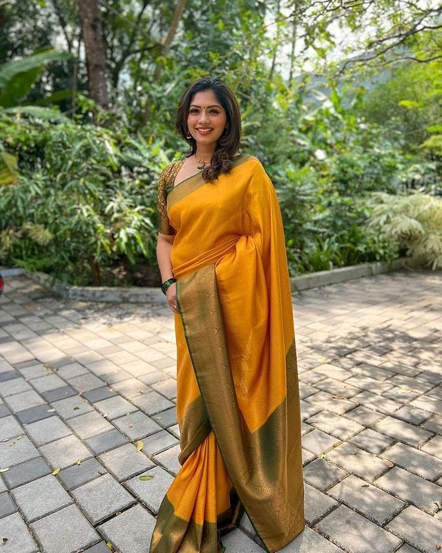 Dazzling Yellow Soft Silk Saree with Beautiful Blouse Piece