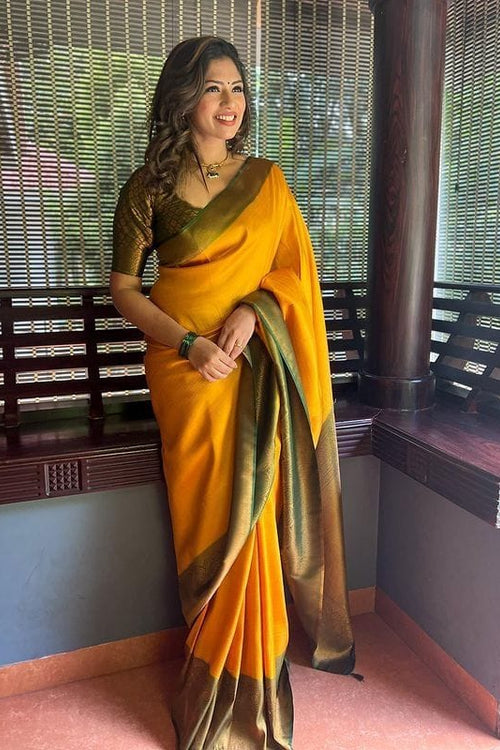 Load image into Gallery viewer, Dazzling Yellow Soft Silk Saree with Beautiful Blouse Piece
