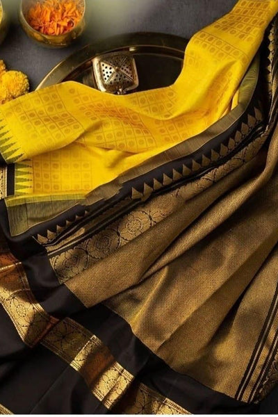 Delectable Yellow Soft Banarasi Silk Saree With Magnetic Black Blouse Piece