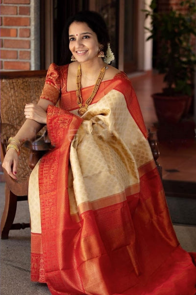 Eye catching Beige Soft Banarasi Silk Saree With Glowing Blouse Piece
