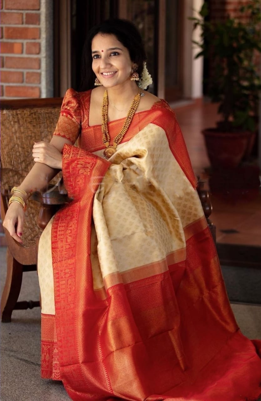 Eye catching Beige Soft Banarasi Silk Saree With Glowing Blouse Piece