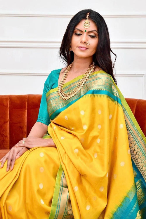 Load image into Gallery viewer, Staring Yellow Soft Banarasi Silk Saree With Charming Blouse Piece
