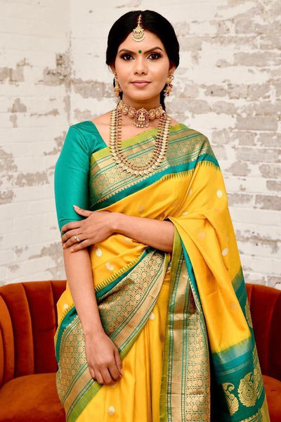 Staring Yellow Soft Banarasi Silk Saree With Charming Blouse Piece