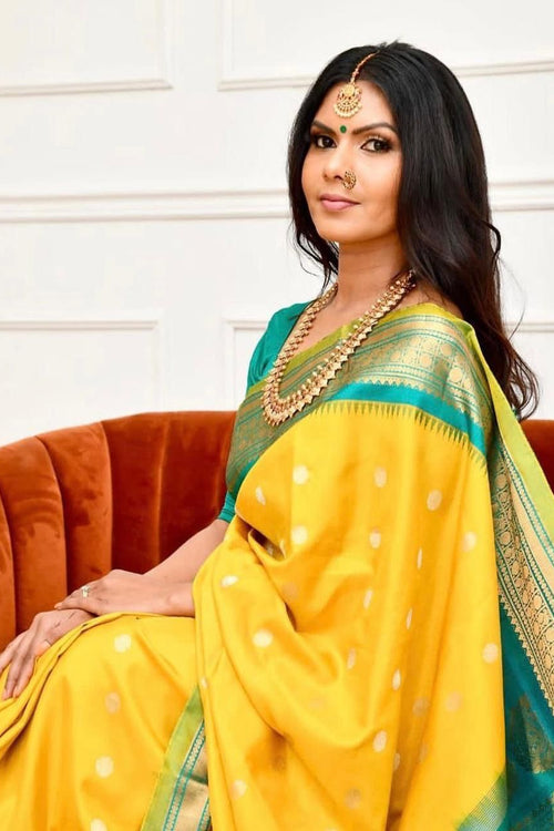 Load image into Gallery viewer, Staring Yellow Soft Banarasi Silk Saree With Charming Blouse Piece
