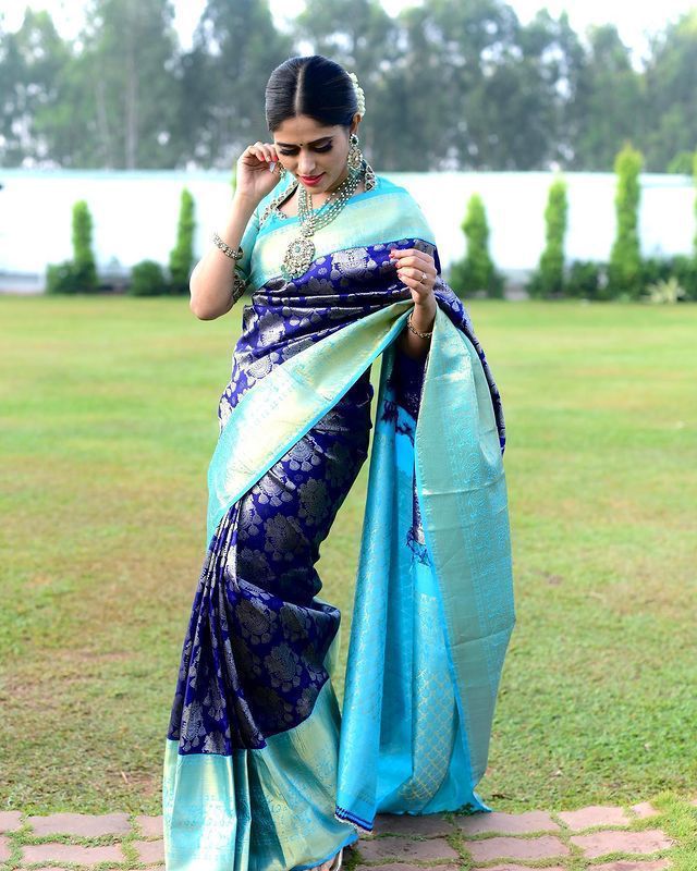 Denouement Blue Soft Banarsi Silk Saree With Glorious Blouse Piece