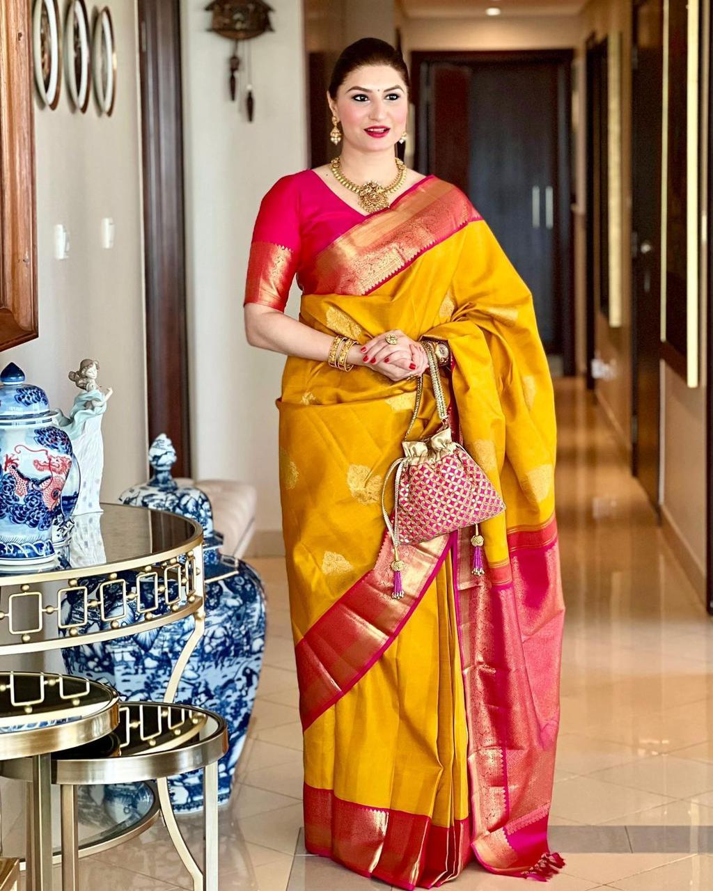 Prominent Yellow Soft Banarasi Silk Saree With Blissful Blouse Piece