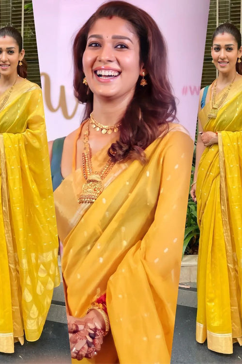 Load image into Gallery viewer, Outstanding Yellow Soft Silk Saree with Phenomenal Blouse Piece
