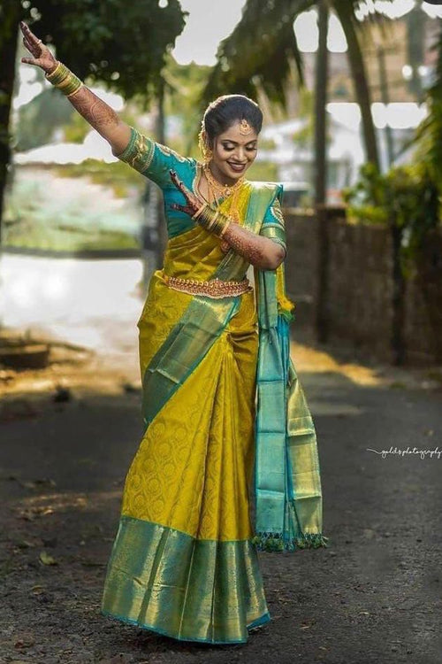 Load image into Gallery viewer, Magnetic Yellow Soft Banarasi Silk Saree With Scintilla Blouse Piece

