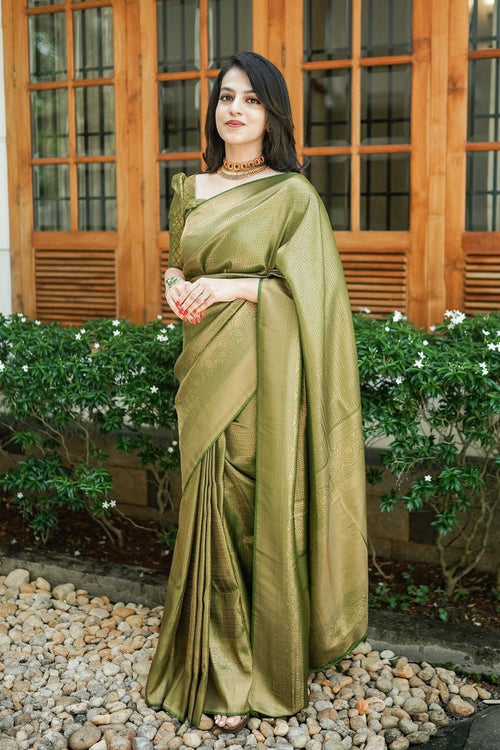 Load image into Gallery viewer, Scintilla Green Soft Silk Saree With Incredible Blouse Piece
