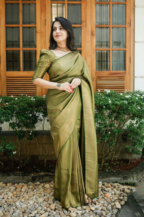 Load image into Gallery viewer, Scintilla Green Soft Silk Saree With Incredible Blouse Piece
