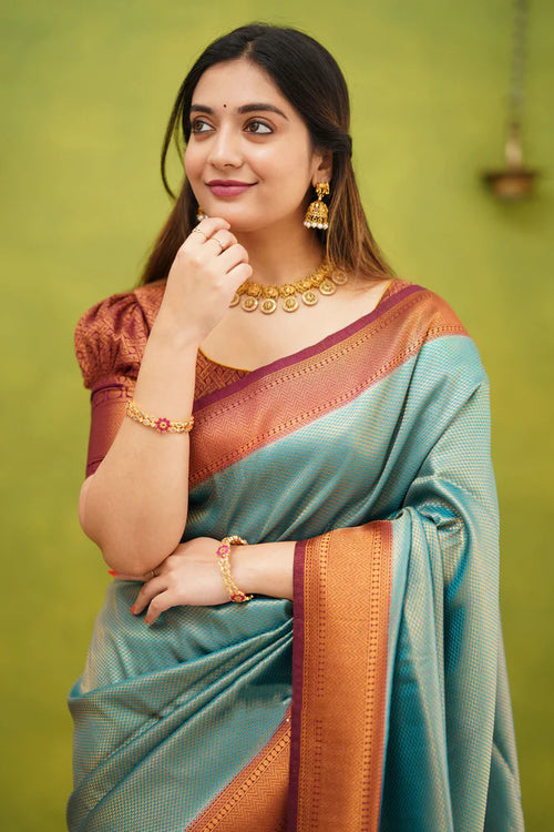 Load image into Gallery viewer, Exuberant Firozi Soft Banarasi Silk Saree With Supernal Blouse Piece
