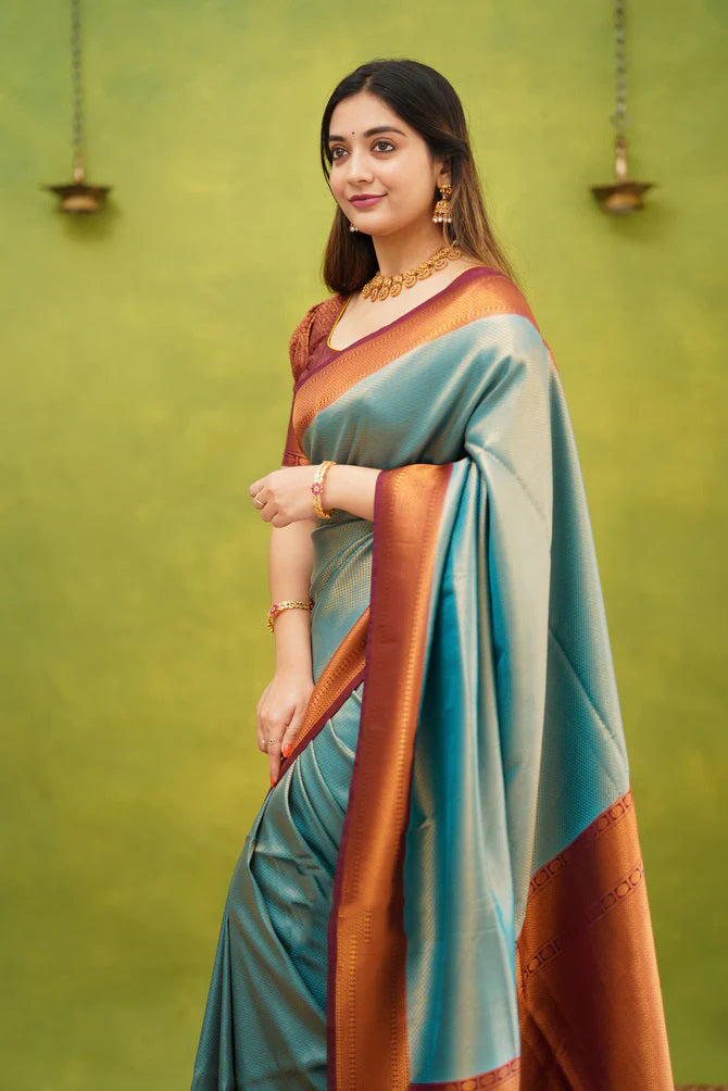 Exuberant Firozi Soft Banarasi Silk Saree With Supernal Blouse Piece