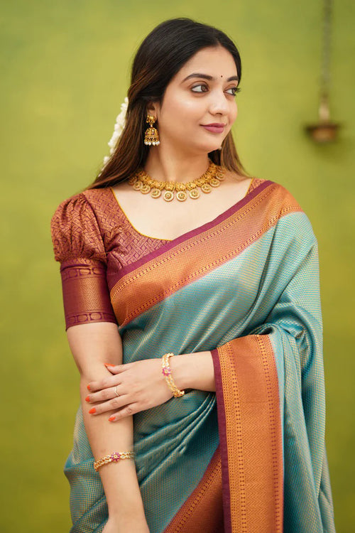 Load image into Gallery viewer, Exuberant Firozi Soft Banarasi Silk Saree With Supernal Blouse Piece
