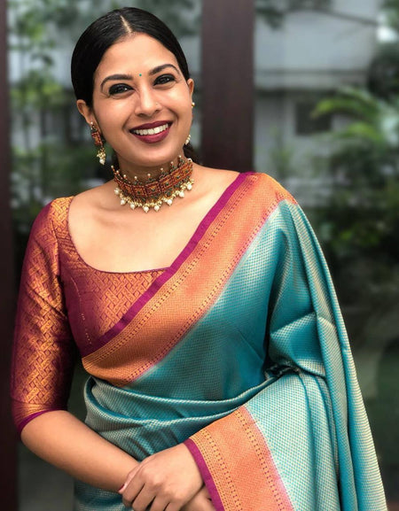 A glam Rama Soft Silk Saree with Beauteous Blouse Piece