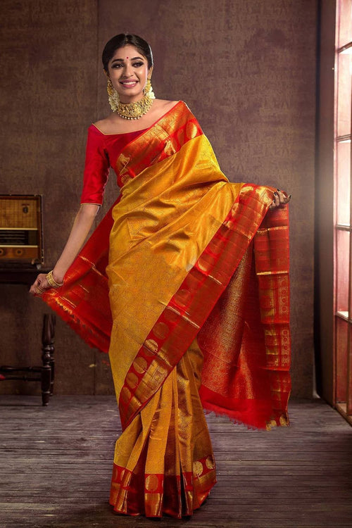 Load image into Gallery viewer, Adorning Yellow Soft Banarasi Silk Saree With Flattering Blouse Piece
