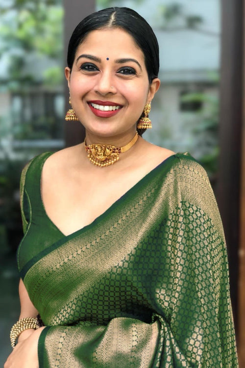 Load image into Gallery viewer, Flamboyant Green Soft Silk Saree With Gleaming Blouse Piece
