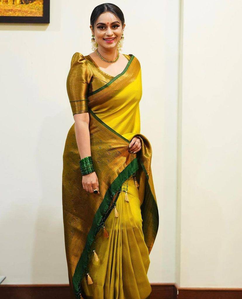 Attractive Yellow Soft Silk Saree With Pretty Blouse Piece