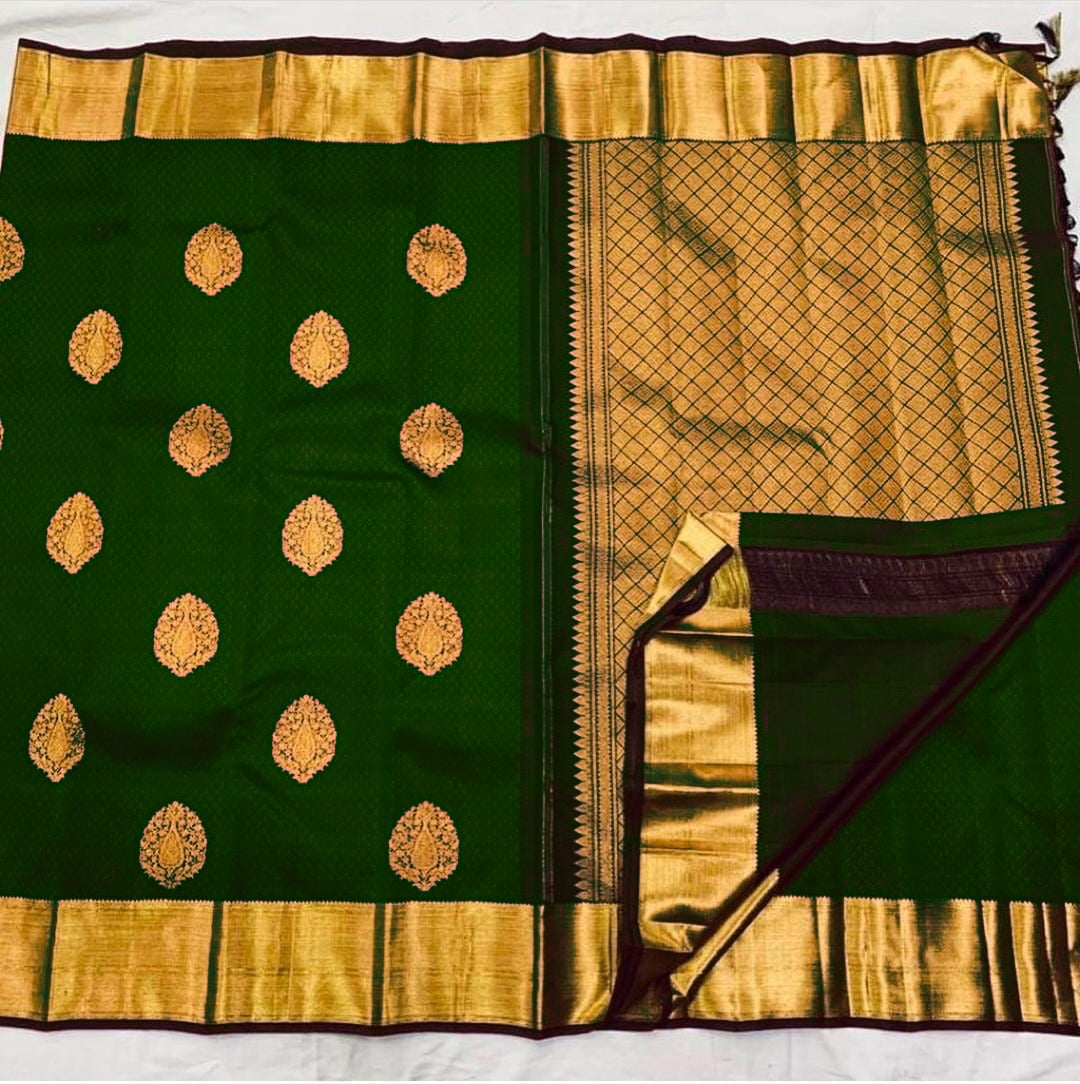 Quintessential Dark Green Soft Banarasi Silk Saree With Lissome Blouse Piece