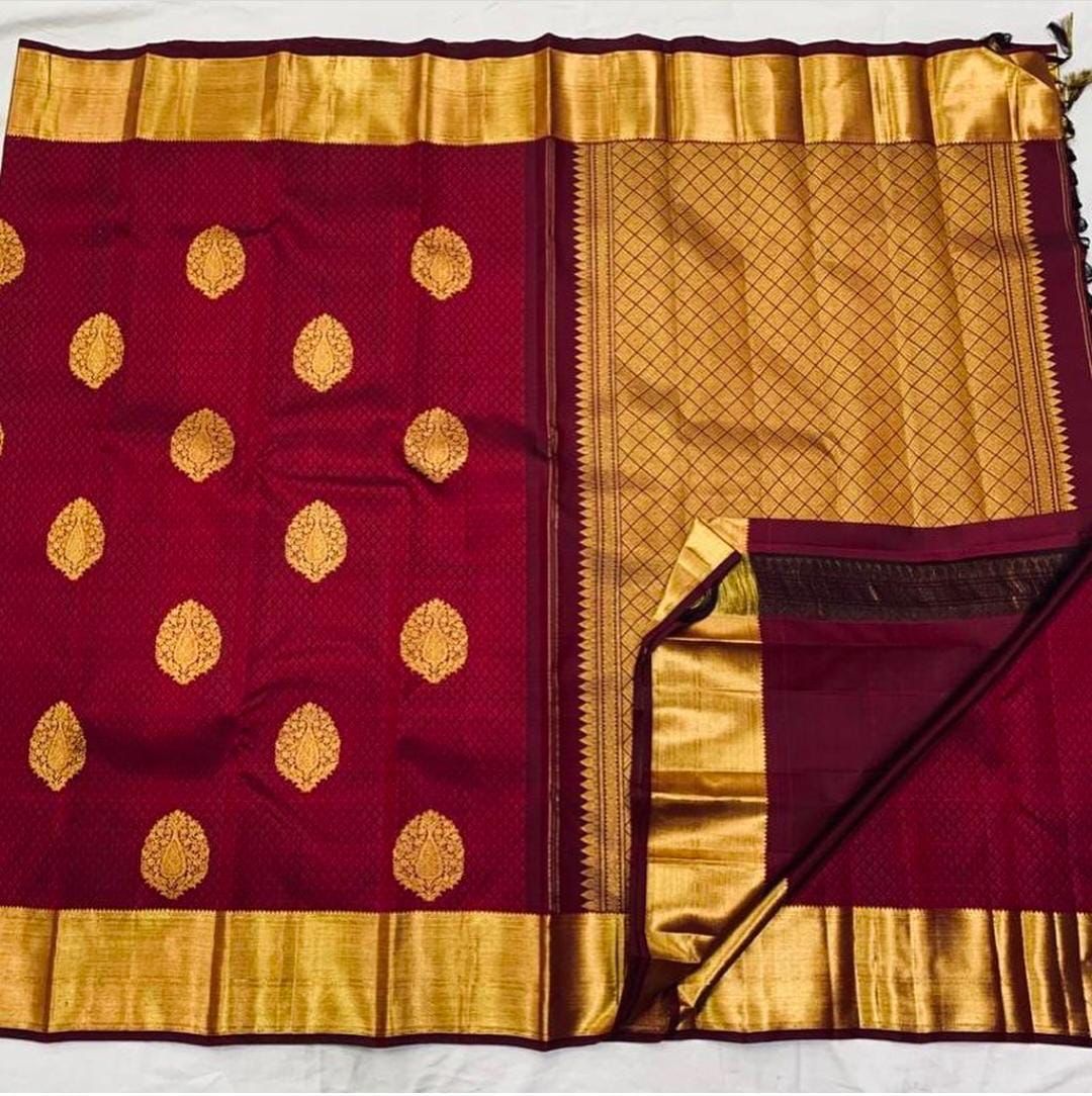 Lassitude Maroon Soft Banarasi Silk Saree With Lissome Blouse Piece