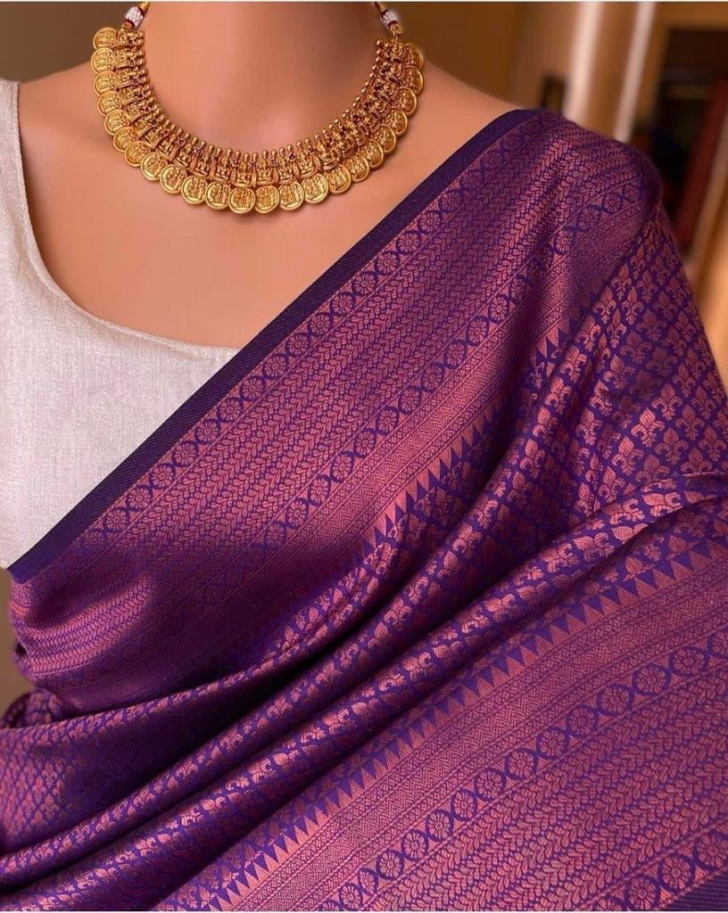 Stunner Purple Soft Silk Saree With Demure Blouse Piece