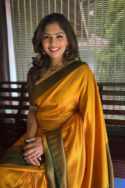 Dazzling Yellow Soft Silk Saree with Beautiful Blouse Piece