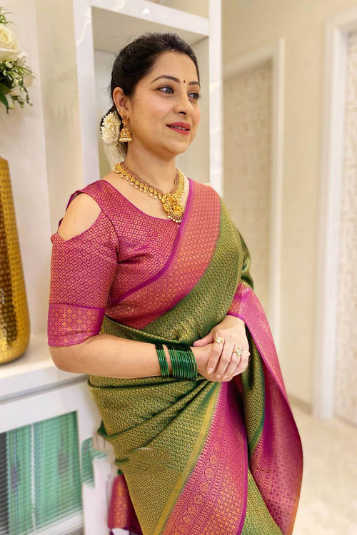 Load image into Gallery viewer, Adoring Green Soft Silk Saree With Cynosure Blouse Piece
