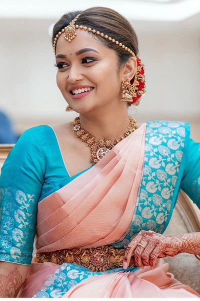 Moiety Peach Soft Banarasi Silk Saree With Impressive Blouse Piece