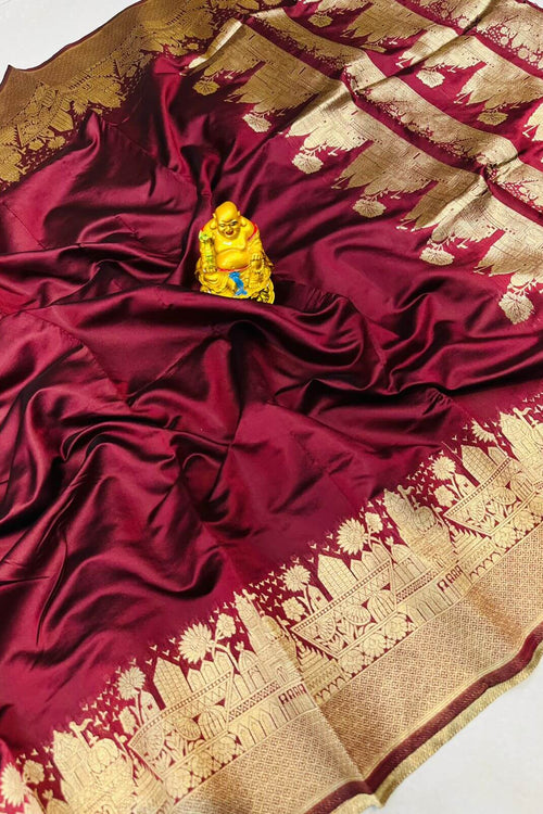 Load image into Gallery viewer, Fancifull Maroon Soft Banarasi Silk Saree With Gossamer Blouse Piece
