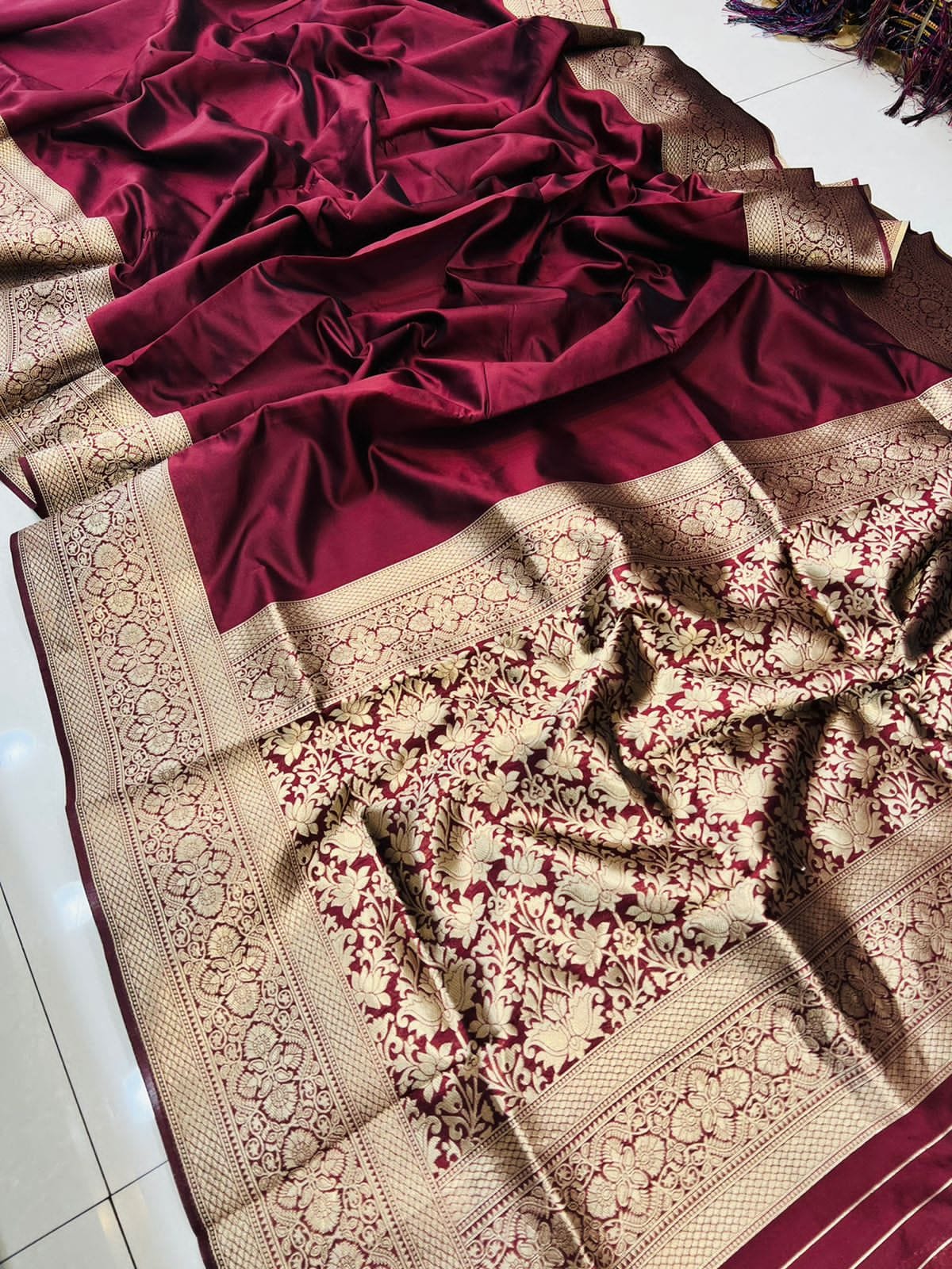 Adorning Wine Soft Banarasi Silk Saree With Intricate Blouse Piece