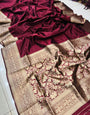 Adorning Wine Soft Banarasi Silk Saree With Intricate Blouse Piece