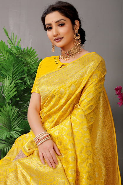 Smart Yellow Banarasi Silk Saree With Fairytale Blouse Piece