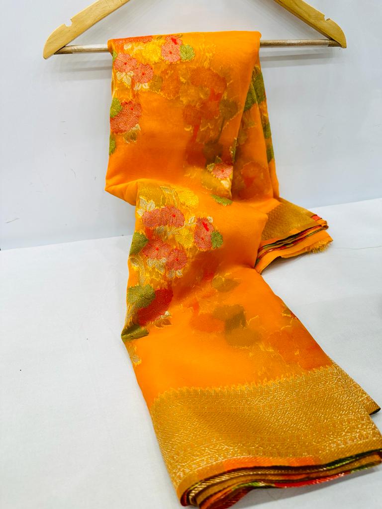 Dazzling Orange Organza Silk Saree with Adorning Blouse Piece