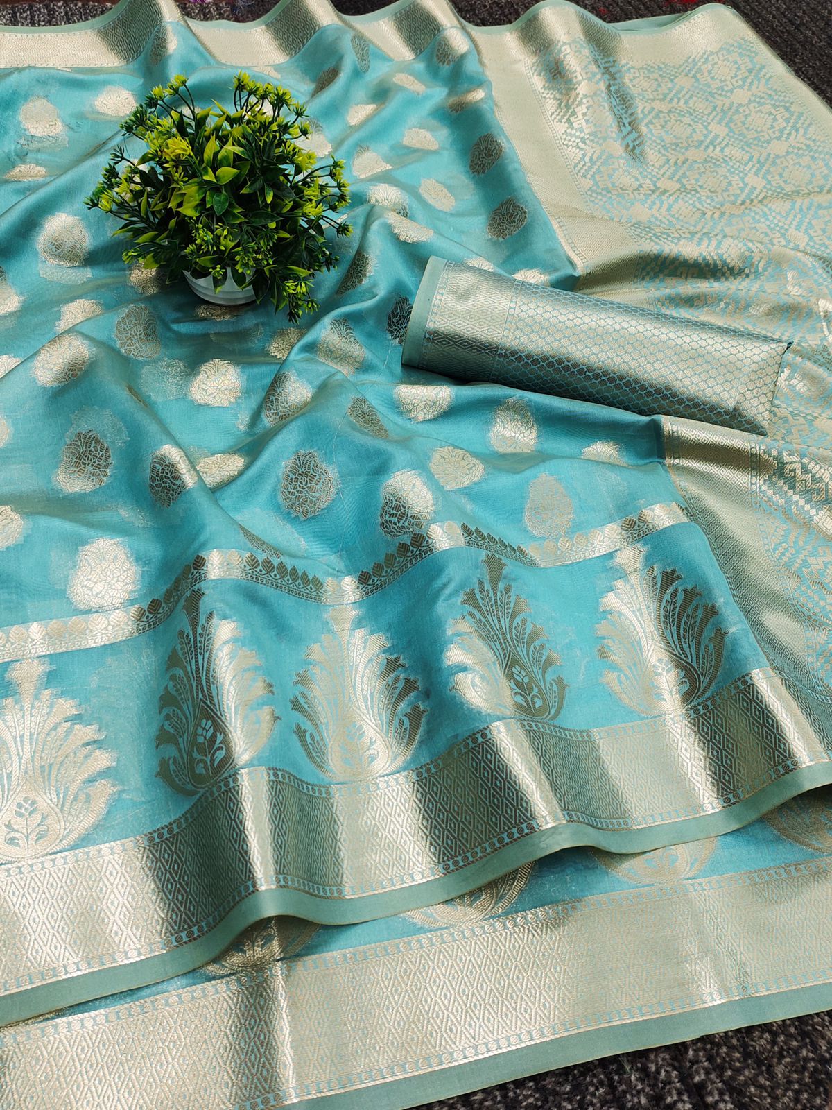 Snappy Firozi Orgeanza Silk Saree With Comely Blouse Piece
