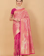 Groovy Dark Pink Banarasi Silk Saree With Extraordinary Blouse Piece