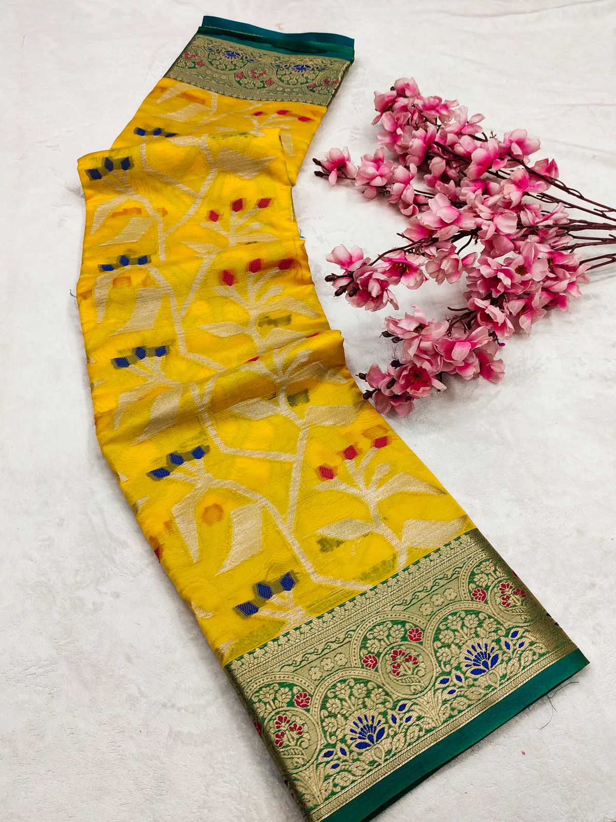 Classy Yellow Organza Silk Saree With Comely Blouse Piece