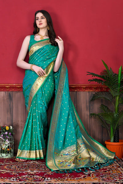 Eye-catching Rama Paithani Silk Saree With Ethnic Blouse Piece