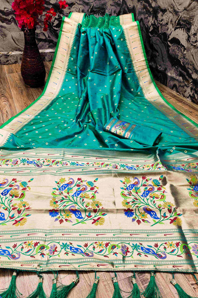 Eye-catching Rama Paithani Silk Saree With Ethnic Blouse Piece