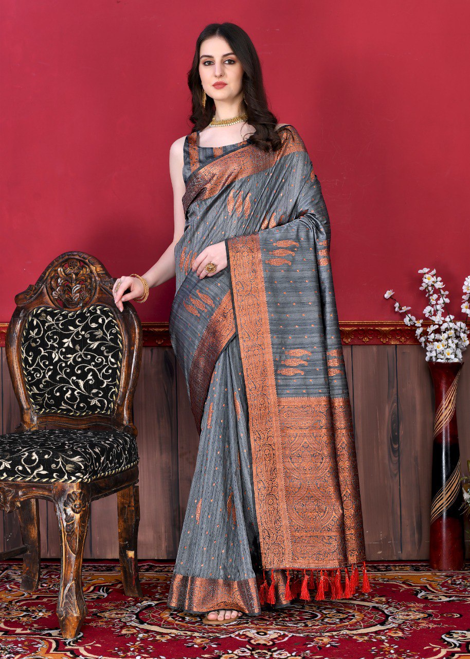 Engrossing Grey Soft Banarasi Silk Saree With Incomparable Blouse Piece